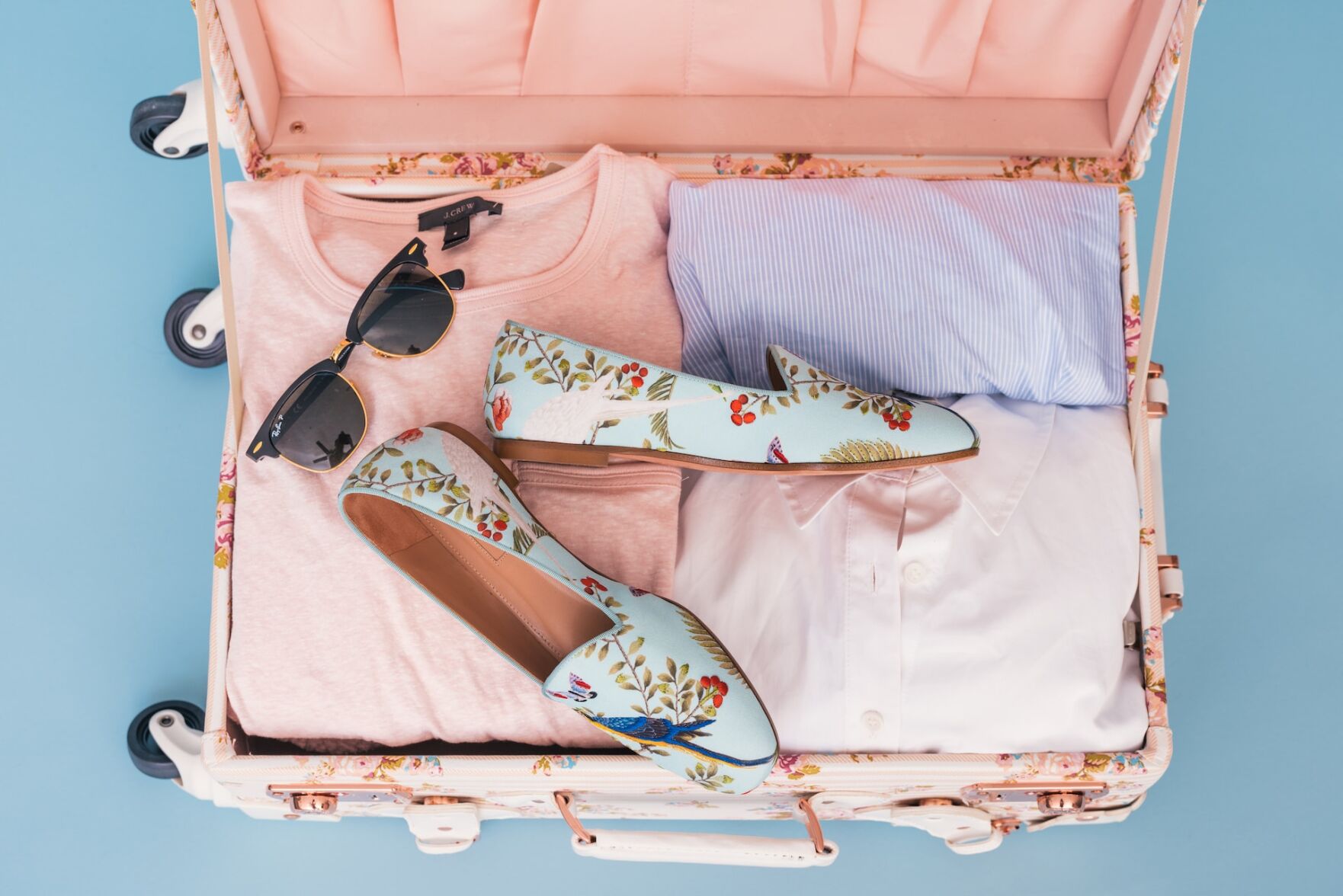 Suitecase packed with co-ords for a getaway weekend